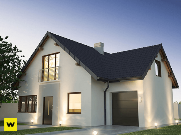 Modernes Einfamilienhaus mit Garage, Satteldach und gepflegtem Vorgarten bei Sonnenuntergang.